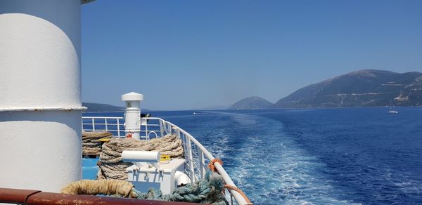 Panoramic view of sea against clear blue sky