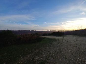 Scenic view of landscape against sky during sunset