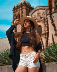 Young woman wearing hat