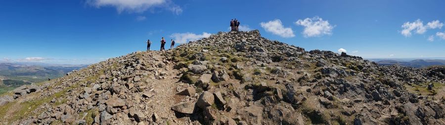 Panoramic view of rocks on mountain against sky