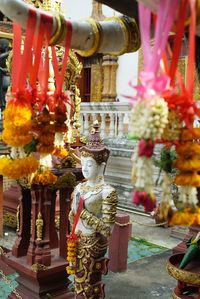 Statue of people outside temple