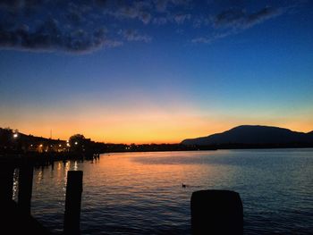 Scenic view of sea against sky at sunset