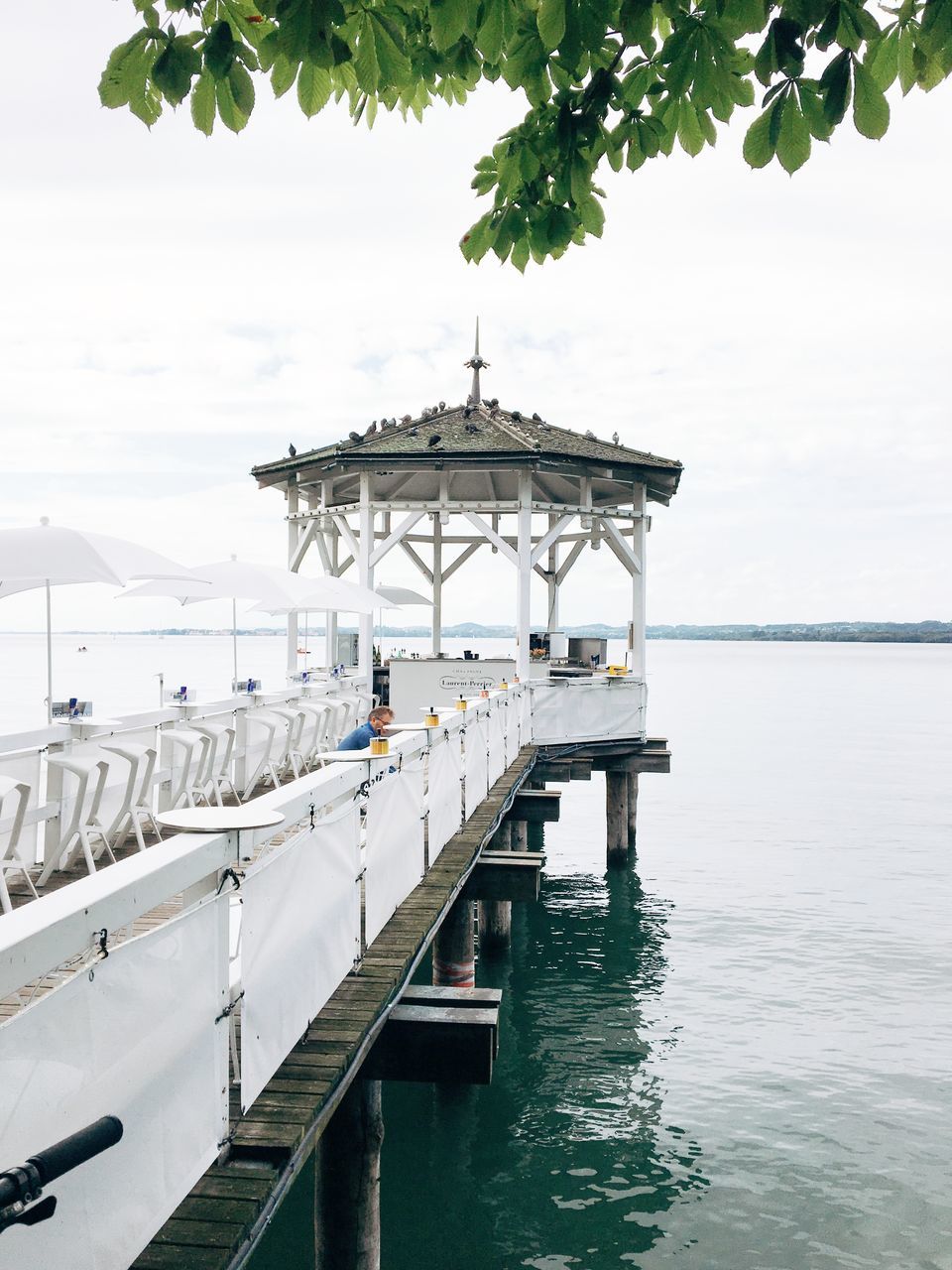 water, architecture, sky, built structure, nature, nautical vessel, sea, transportation, day, railing, no people, outdoors, mode of transportation, tree, building exterior, pier, cloud - sky, beauty in nature, plant, luxury