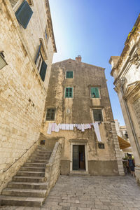 Low angle view of old building against sky