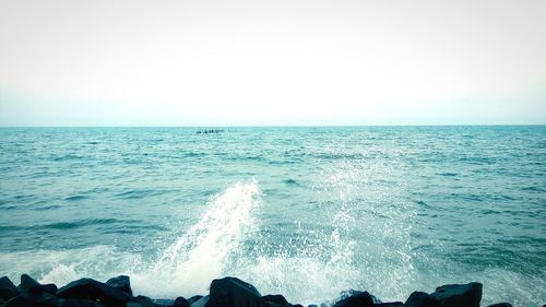 Scenic view of sea against clear sky