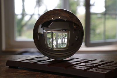 Close-up of electric lamp on table