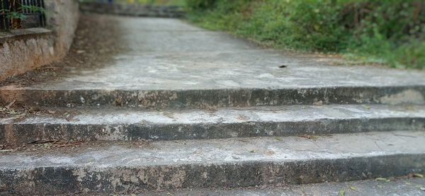 Surface level of footpath by wall