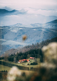 Scenic view of landscape and mountains against sky