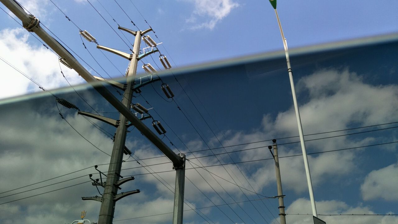 LOW ANGLE VIEW OF POWER LINES AGAINST SKY