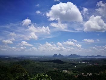 Scenic view of landscape against blue sky