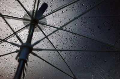 Full frame shot of raindrops on umbrella