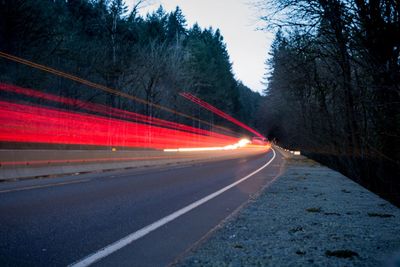 Light trails on road at night