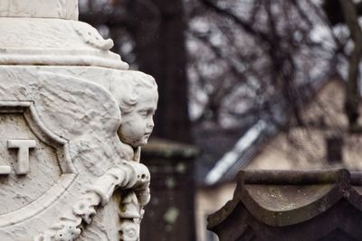 Statue against temple