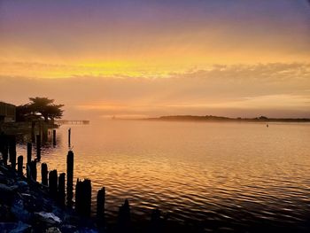 Scenic view of sea against sky during sunset