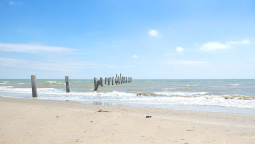 Scenic view of beach against sky