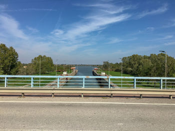 Bridge over river against sky