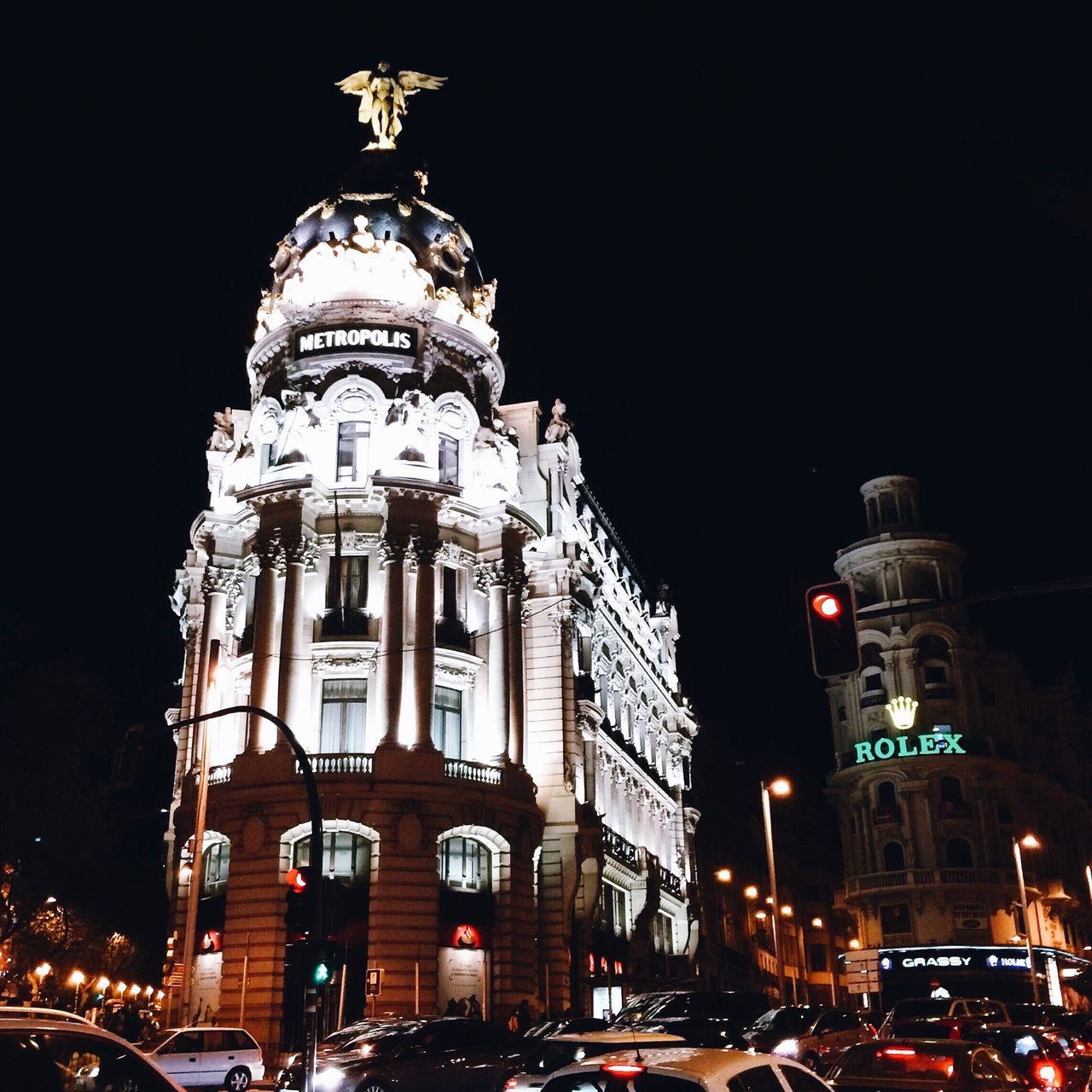 architecture, building exterior, built structure, illuminated, night, car, transportation, land vehicle, city, mode of transport, travel, street, travel destinations, famous place, low angle view, international landmark, capital cities, tower, clock tower, city street