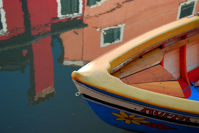 Close-up of boat moored in canal