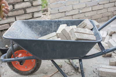 Bricks in wheelbarrow at construction site