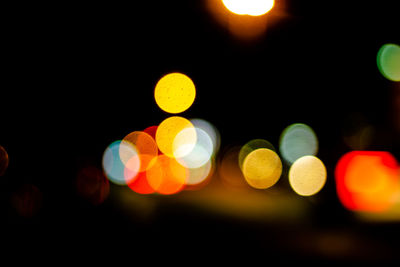 Defocused image of illuminated lights at night