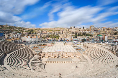 Roman theater against cloudy sky