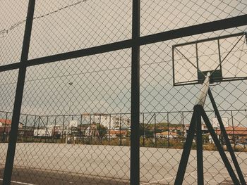 Chainlink fence against sky