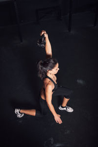 Woman exercising in gym