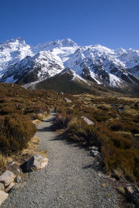 Scenic view of mountains against sky during winter