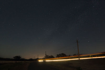 Scenic view of illuminated star field against sky at night