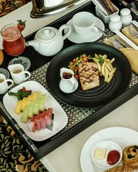 High angle view of breakfast served on table
