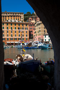 Boats moored in canal