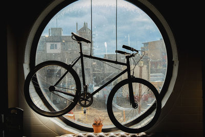 Bicycle seen through glass window