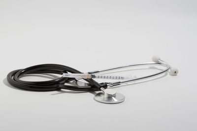 High angle view of electric lamp against white background