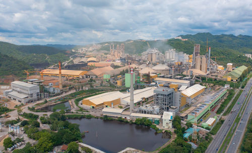 High angle view of river amidst buildings in city