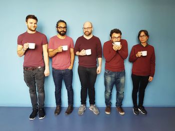 Group of people against white background