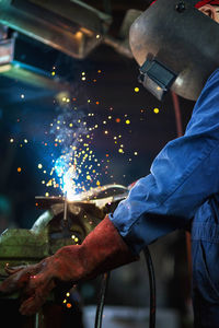 Man working on metal