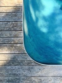 Wooden posts in calm blue sea