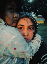 Portrait of mother and daughter