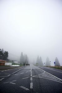 Empty road against clear sky