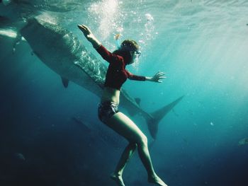 Man swimming in sea