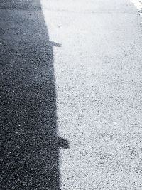 Low section of shadow on road