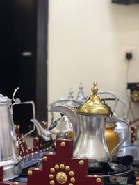 Teapots on table