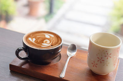 Coffee cup on table