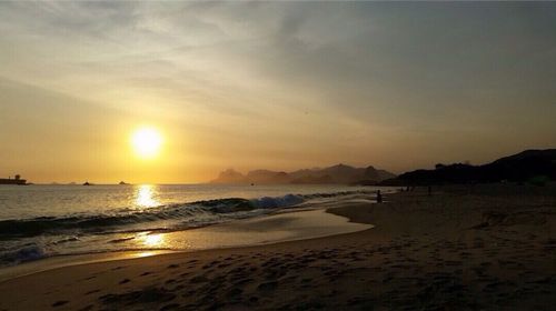 View of beach at sunset