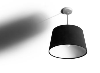 Low angle view of pendant light hanging from ceiling