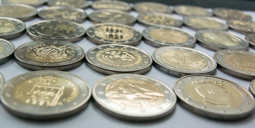 Close-up of coins on table