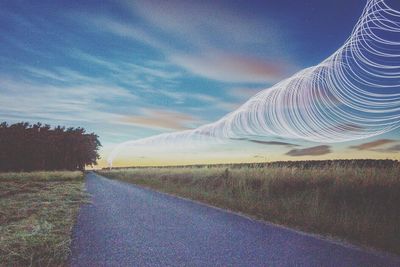 Empty road along landscape