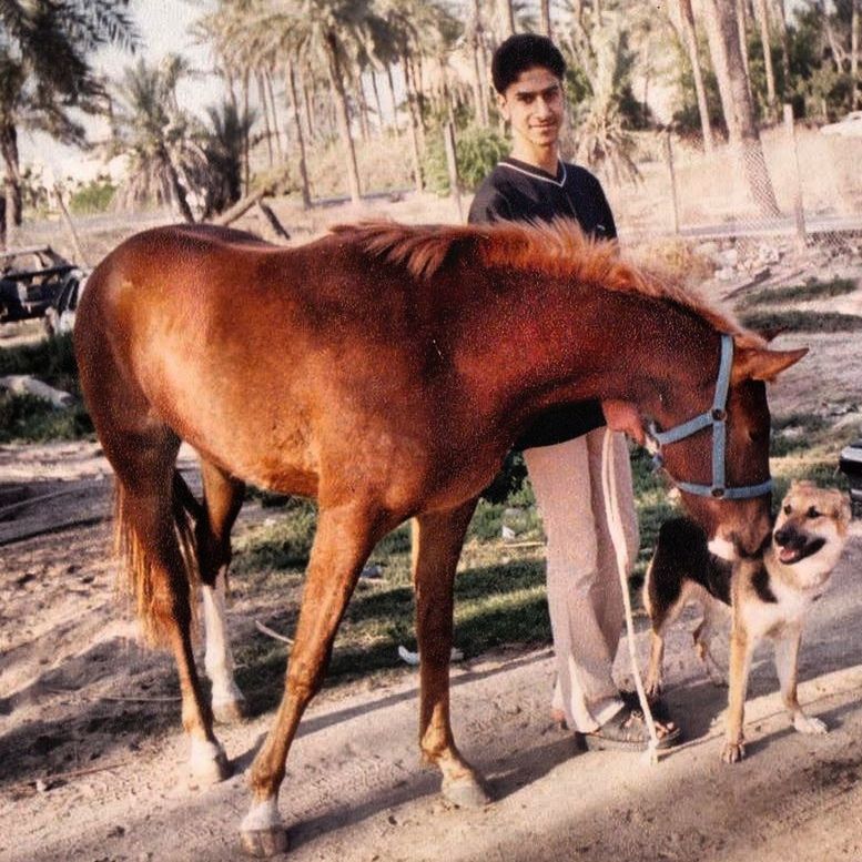 YOUNG WOMAN WITH DOG