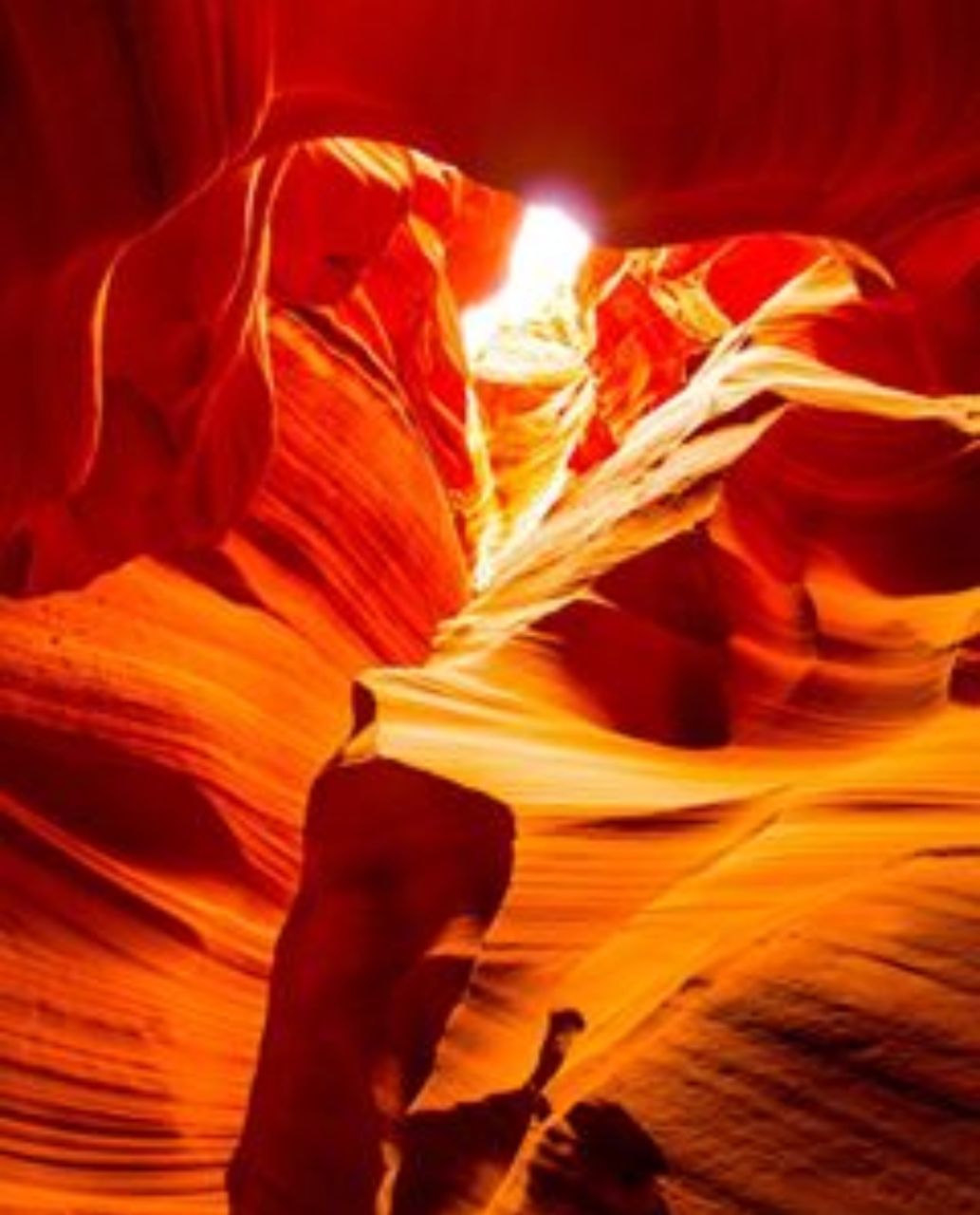 nature, red, orange color, no people, yellow, indoors, rock, rock - object, abstract, beauty in nature, fire, heat - temperature, canyon, close-up, multi colored, burning, sandstone