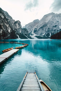 Pier over lake against sky